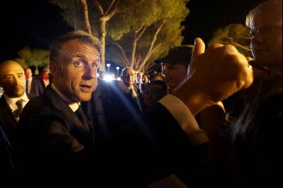Return in Sight: Macron's Double Denial's Image